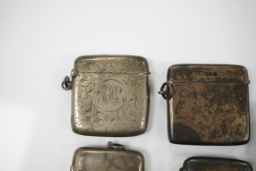 Five assorted late 19th/early 20th century silver vesta cases, largest 58mm. Condition - poor to fair